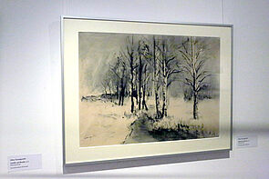 Auf dem Bild ist eine Winterlandschaft mit Bäumen zu sehen.